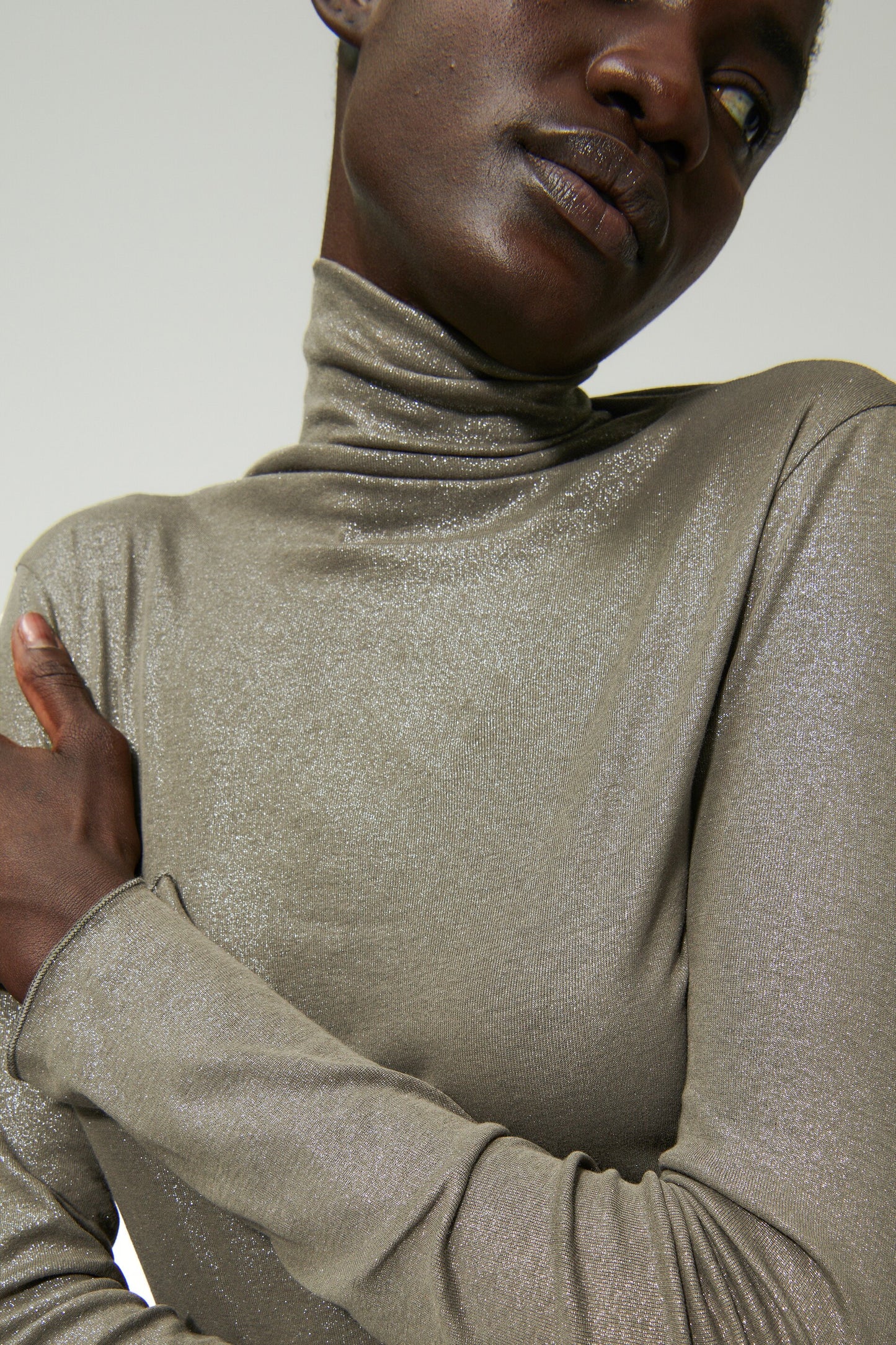 Sweater with shiny all-over foil print