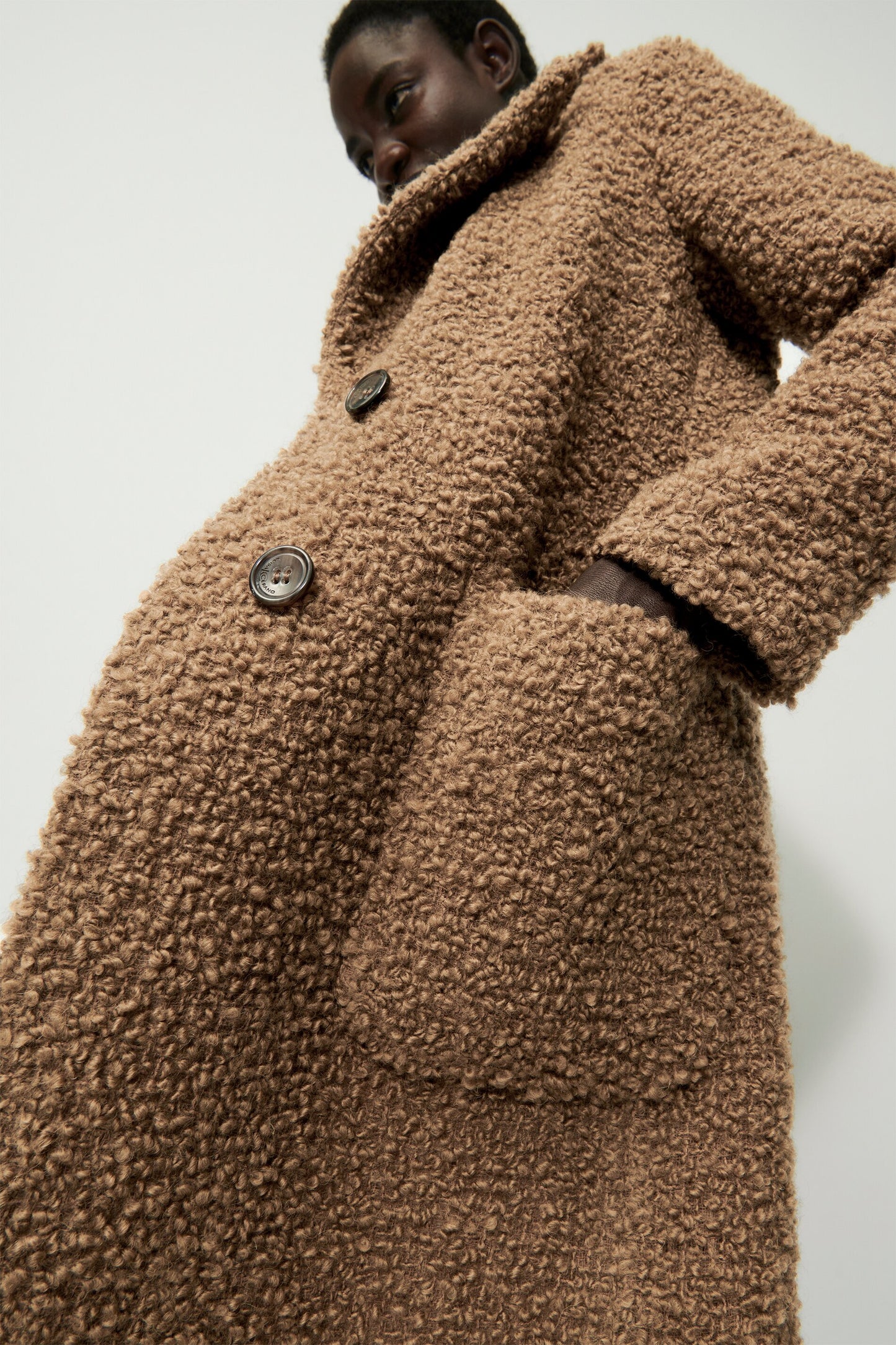 Long coat in luxurious bouclé wool