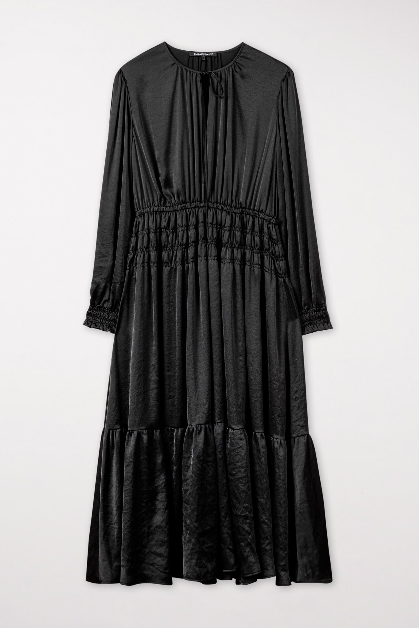 Ruffled dress with smocked details