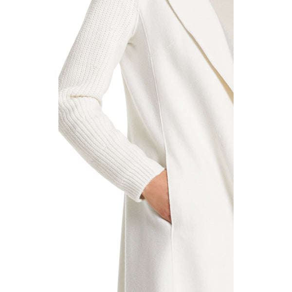 Felt coat with knitted decoration