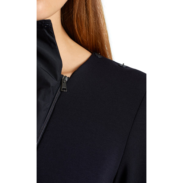 Dress with an asymmetric flounce