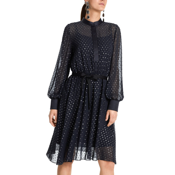 Dress with silver foil particles