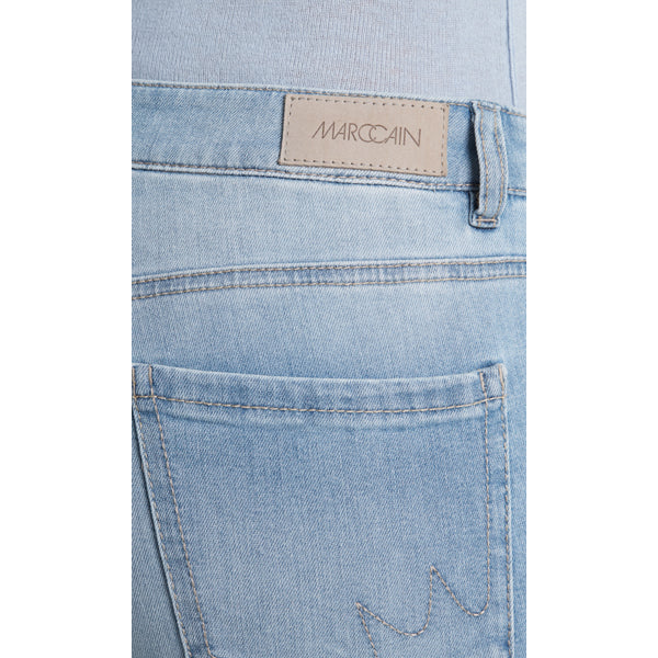 Cropped jeans with fringes