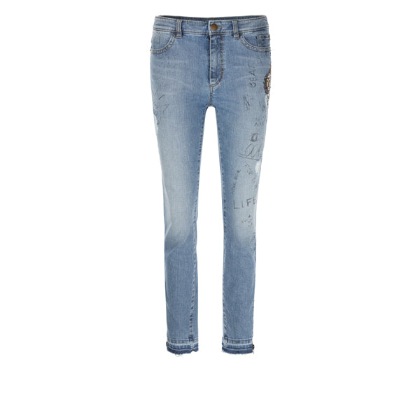 Jeans with lion appliqué
