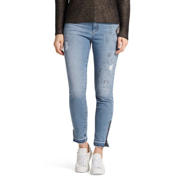 Jeans with lion appliqué
