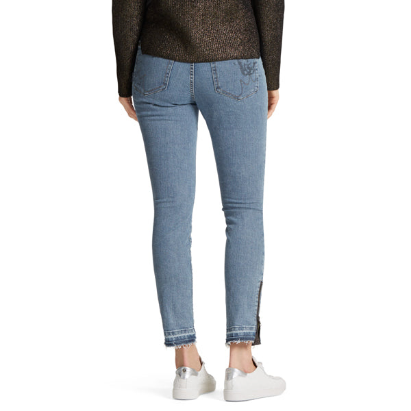 Jeans with lion appliqué