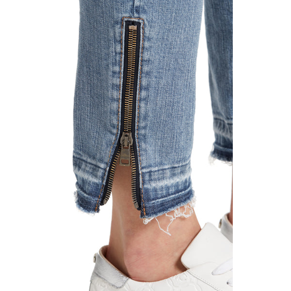 Jeans with lion appliqué