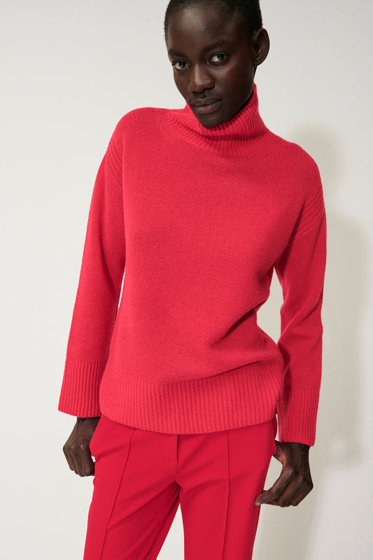 Turtleneck pullover with a small side slit
