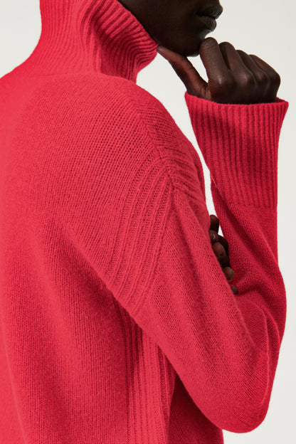 Turtleneck pullover with a small side slit